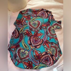 Local boutique stretchy top. Beautiful on. Tunic length. 3/4 sleeves.